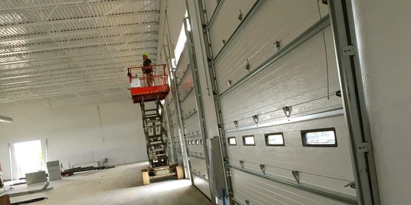 Extension garage door spring repair